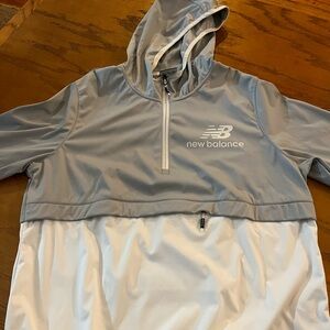 Women’s gray and white pull over windbreaker jacket